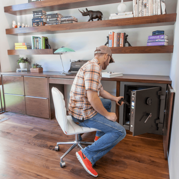 man opening home safe